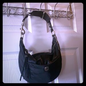 Coach black purse with turquoise inside Medium